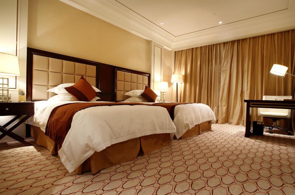 Landison Green Town Hotel Xinchang Camera foto