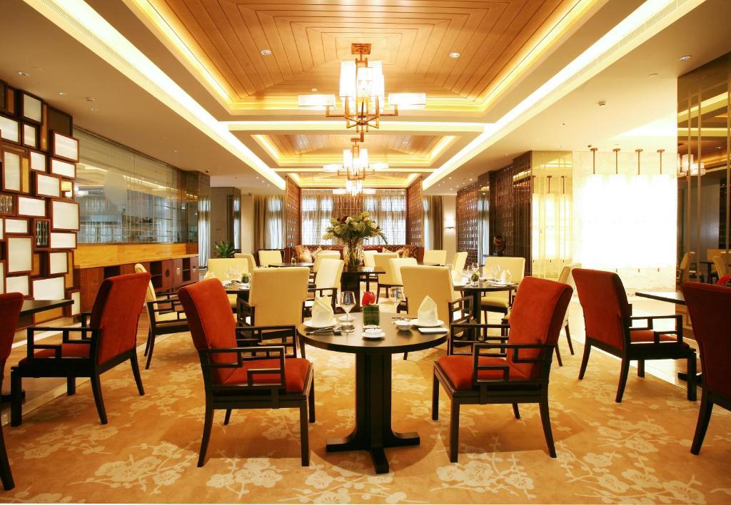 Landison Green Town Hotel Xinchang Esterno foto