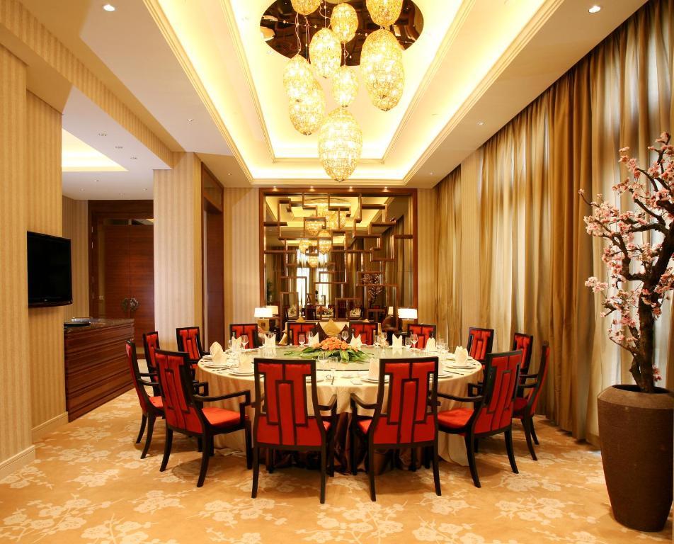 Landison Green Town Hotel Xinchang Esterno foto