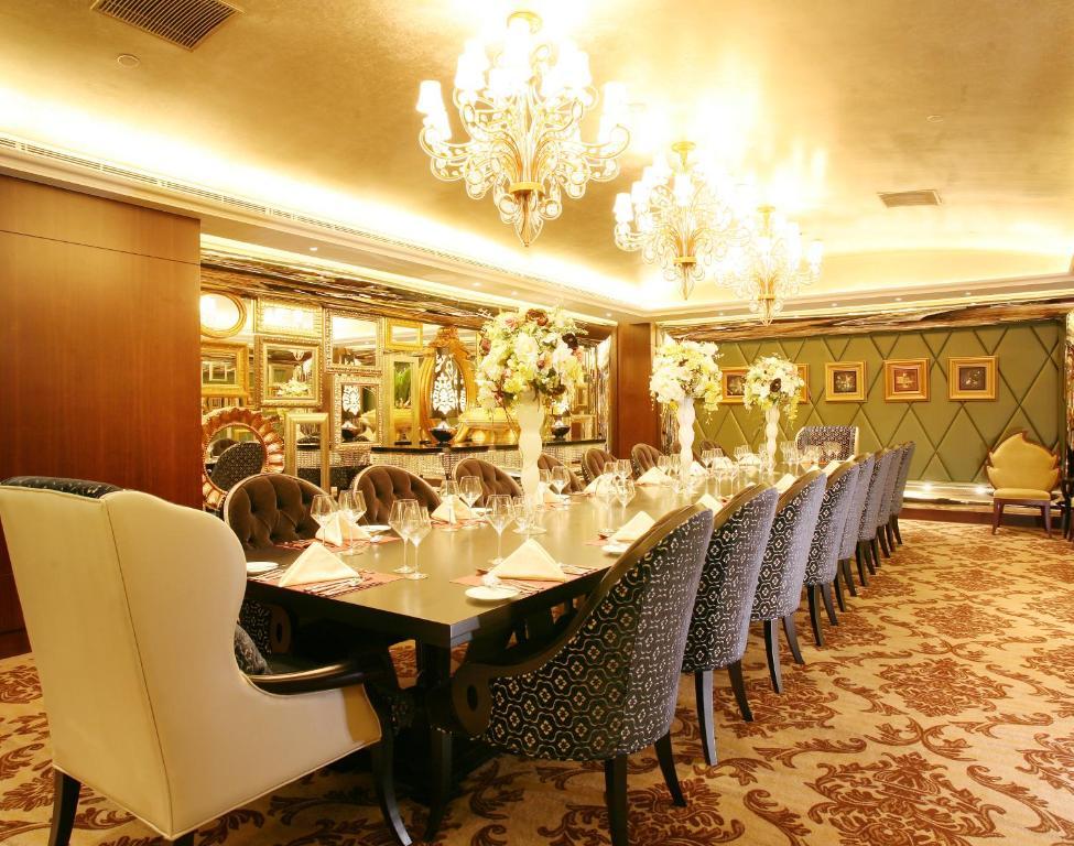 Landison Green Town Hotel Xinchang Esterno foto