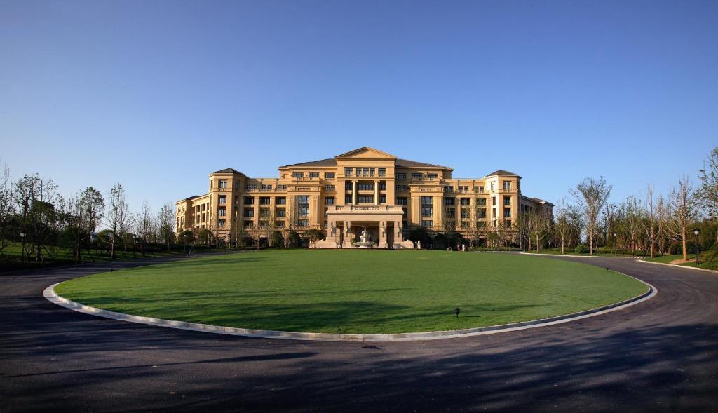 Landison Green Town Hotel Xinchang Esterno foto